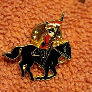 RCMP anniversary lapel pin in excellent condition , signed